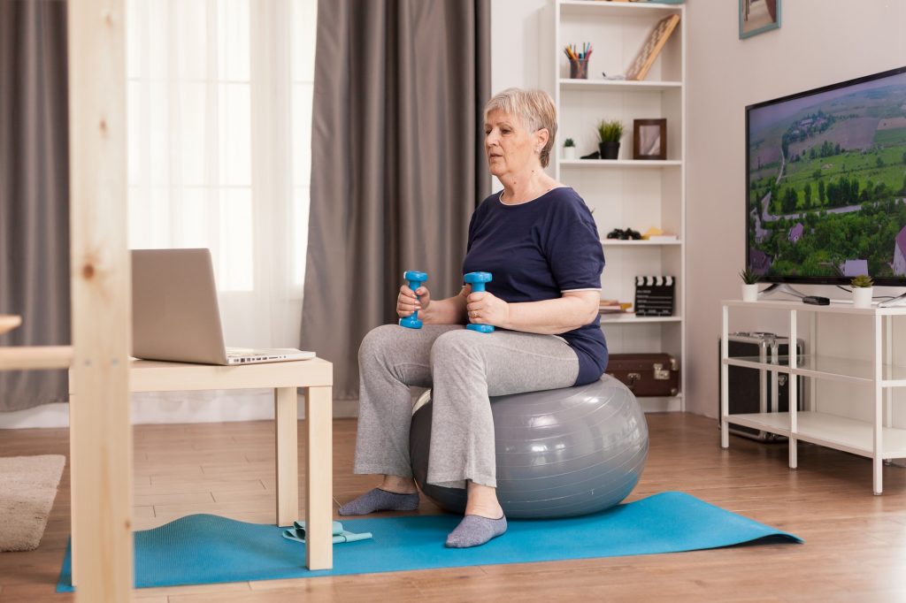 Watching online fitness lesson
